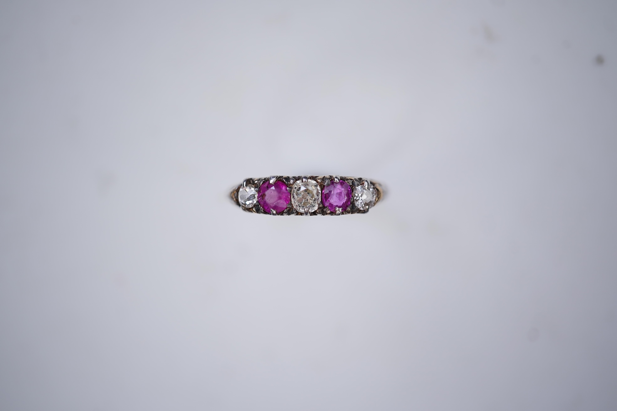 A pink sapphire and diamond ring, early 20th century